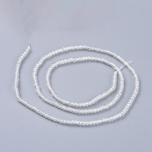 Etoile Micro Crystal Rondelles 2x1.5mm - Strand of approx 200 - Crystal AB